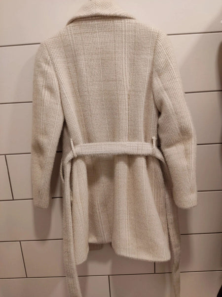 Kreminės/baltos spalvos paltas